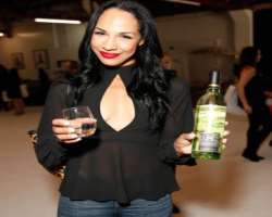 Amanda Brugel consuming alcohol Amanda Brugel consuming alcohol